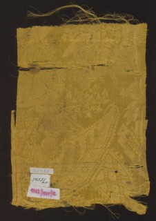 Fabric fragment, patterned silk damask, early 18th century, France. Yellow semi-silk damask with