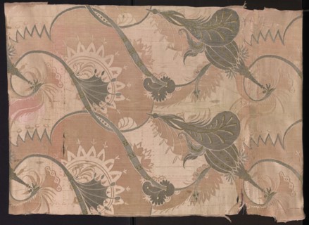 Fragment of pink silk brooch fabric with a fanciful and floral pattern in the Bizarr type. Early