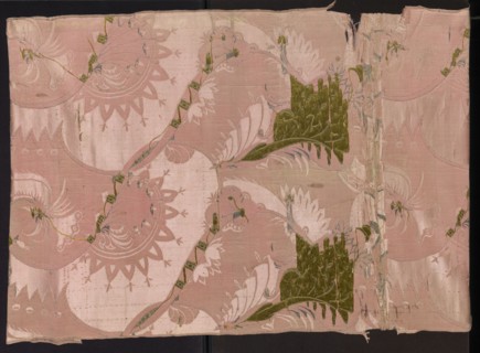 Fragment of pink silk brooch fabric with a fanciful and floral pattern in the Bizarr type.
