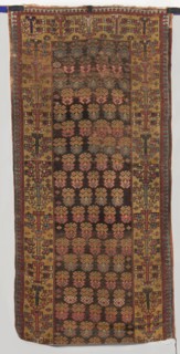 Carpet, gift; 18th century, Caucasus. Main field with floral branches arranged in alternating rows.
