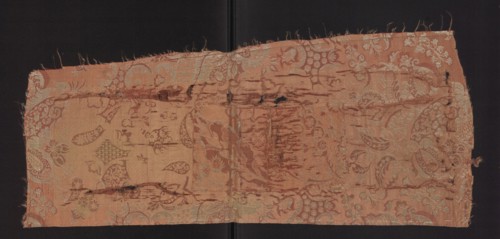 Fabric fragment, fragments of a larger textile object, patterned silk fabrics. Pale red pink lampas
