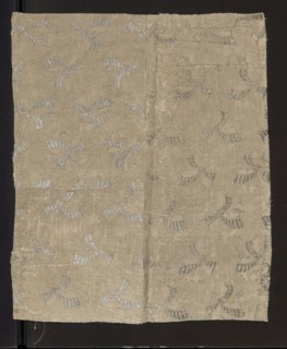 Fabric fragment, fragments of silk patterned fabric with preserved pattern. Fragment showing a