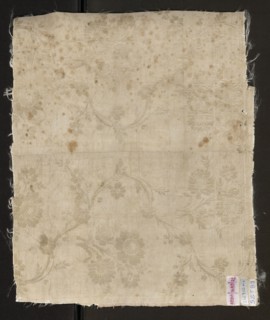 Fabric fragment, silk, patterned floral double-warp fabric. Cream and silver lamé with a pattern of