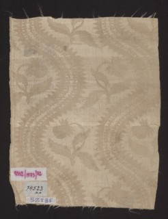 Fragment of silk fabric, patterned floral damask with plain weave background and lisere pattern;