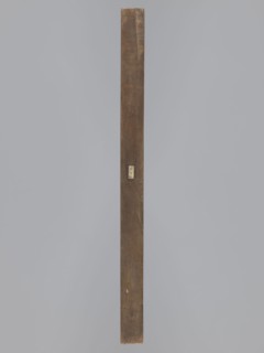 Double-sided gingerbread mould. Side A: image of a bachelor; Side B: baby in swaddling clothes.,