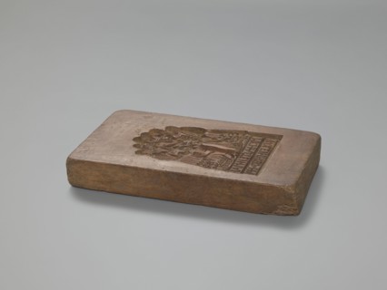 Double-sided gingerbread mould; obverse: group of figures — two women and a child; reverse: group