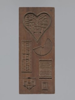 Double-sided gingerbread mould. Obverse: three laurel-wreathed hearts, each containing a scene of a