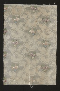 Fabric fragment, fragments of silk patterned fabric with floral patterns. Fragment of