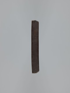 Double-sided gingerbread mould. Side A: female figure in a decorative bonnet and long patterned