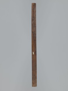 Double-sided gingerbread mould. Side A: female figure in a decorative bonnet and long patterned