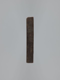 Double-sided gingerbread mould. Side A: female figure in a decorative bonnet and long patterned