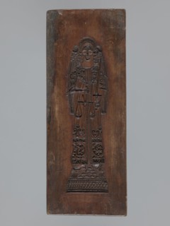 Double-sided gingerbread mould. Obverse: rectangular floral and geometric ornament; a rectangular