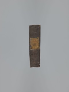 Double-sided gingerbread mould. Obverse: rectangular floral and geometric ornament; reverse: image