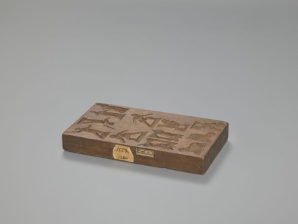 Double-sided gingerbread mould. Obverse: 6 representations; reverse: 11 images of human and animal