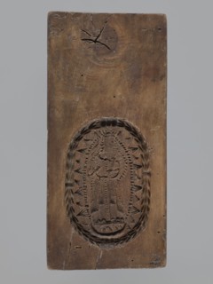 Double-sided gingerbread mould. Obverse: image of Madonna and Child. Reverse: small image of