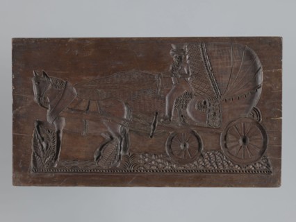 Double-sided gingerbread mould. Obverse: image of a trumpeter on a horse; Reverse: horse-drawn