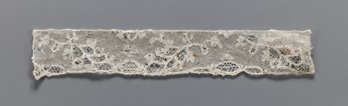 Lace fragment, bobbin lace Valenciennes, white, continuous floral pattern with Rococo motifs, 18th