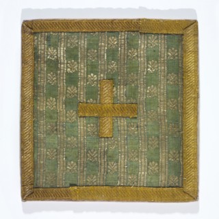 Pall of silk fabric with a fine pattern of stylised floral patterns between gold stripes. Lined