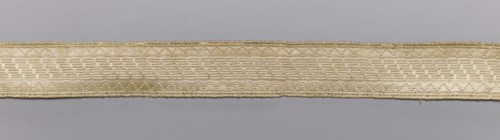 Gallon, galloons haberdashery, geometric ornaments, white warp, weft - wire - drawn thread. Faint