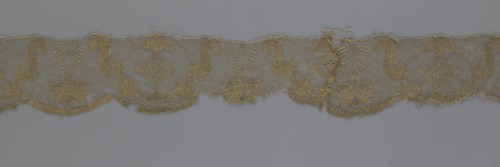 Lace fragment, lace strip finished with flat arched teeth on one side and straight on the other. In