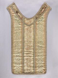 Back of a chasuble, creator unknown, origin unknown. Grosgrain chasuble with plant tendril ornament