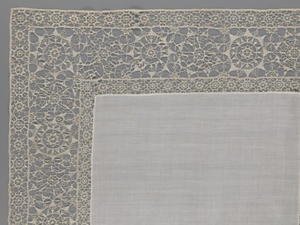 Doily, geometric ornaments; rosettes ornament; doilies; smooth center. Edge made of white linen