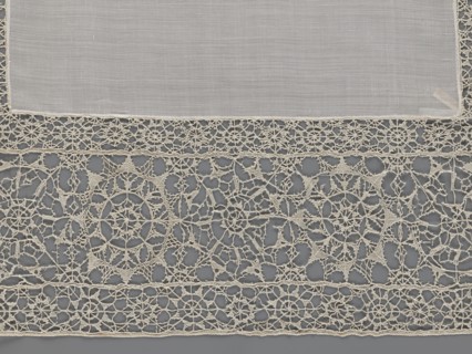 Doily, geometric ornaments, rosettes ornament, doily with smooth center. Edge made of white linen