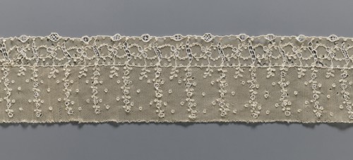 Fragment of lace, lace, ornament: continuous vertical twigs at the top with points between them; at