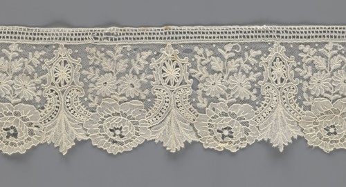 Lace fragment;, purchased provenance noted; lace with plant ornaments. Serrated on one side, with a
