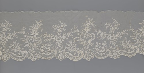 Lace fragment — shuttlecock;, needle lace and bobbin lace; shuttlecocks; tiny spiders — needlework