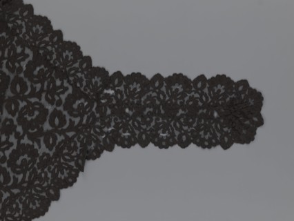 Cape, lace, in the form of a square with two wide, elongated lace ties. Continuous floral ornament