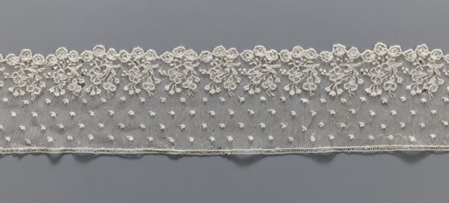 Lace fragment, needle lace Alençon style, 18th century, France. The edge features a broad floral