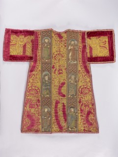 Half of a dalmatic. Preserved half of a dalmatic made of red, patterned, large-scale velvet with