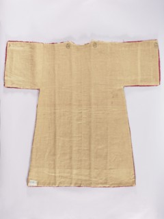 Half of a dalmatic, preserved half made of red, patterned large-scale velvet with pomegranate and