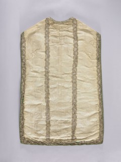 Chasuble, liturgical vestment, 18th century, possibly France. Against a background of broken lines,