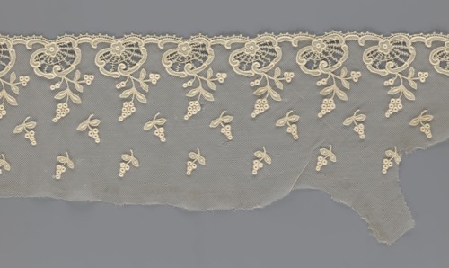 Fragment of lace, lace with plant ornaments, slightly serrated lower edge with shell motifs with