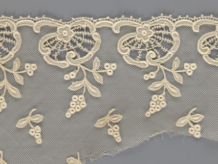 Fragment of lace, lace with plant ornaments, slightly serrated lower edge with shell motifs and