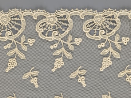 Fragment of lace, lace with plant ornaments, slightly serrated lower edge with shell motifs with