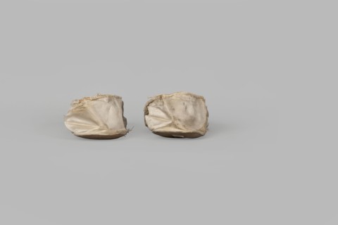 Flat women's slippers of white satin, top edge finished with ribbon. Flat-cut toes, symmetrical