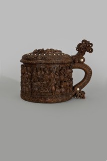 Wooden pear-shaped tankard, so-called peg tankard, carved, round, richly decorated with bas-reliefs