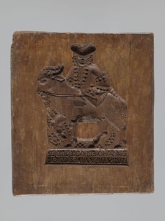 Double-sided gingerbread mould. Rectangular; obverse: man in 18th-century attire tricorn hat,