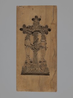 Double-sided gingerbread mould. Obverse: Adam and Eve in paradise—naked figures standing under the