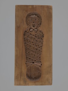 Double-sided gingerbread mould. Obverse: Adam and Eve in paradise; Reverse: baby in swaddling