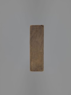 Double-sided gingerbread mould. Obverse: decorative pipe with fluted decoration, letter A in an