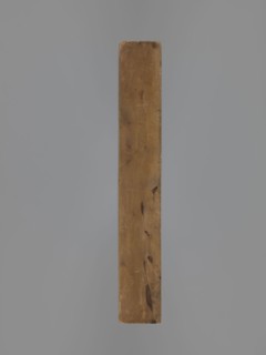 Double-sided gingerbread mould. Obverse: decorative pipe with fluted decoration; on the stem the