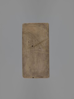 Double-sided gingerbread mold. Obverse: baby in swaddling clothes richly decorated with geometric