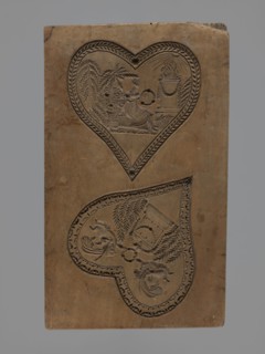 Double-sided gingerbread mould. Obverse: two representations; reverse: four representations.
