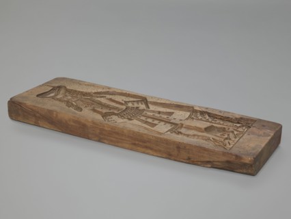 One-sided gingerbread mould with the image of a bachelor. One-sided rectangular mould showing a