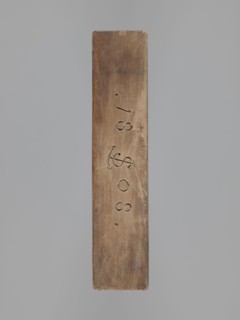 Double-sided gingerbread mould. Obverse: female figure in a long, patterned, richly decorated