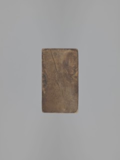 Double-sided gingerbread mould. Obverse: female figure in a long, patterned, richly decorated